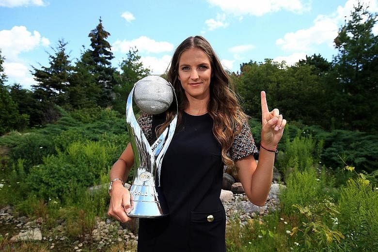 Karolina Pliskova of the Czech Republic with the WTA world No. 1 trophy in Toronto last Sunday. The Rogers Cup will be her first appearance on court since her elevation last month to the top spot, despite never having won a Grand Slam tournament.