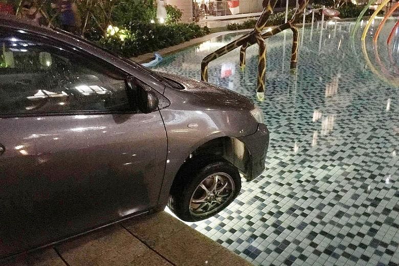 A driver who drove a car into a condominium swimming pool on Tuesday night is still missing, after he hurriedly left the scene following the accident. 	Photographs showed the car's front tyres slightly in the water at the pool at SkyPark Residences, 