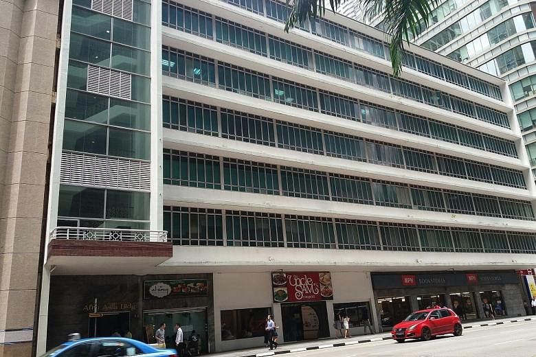 Afro Asia Building, a commercial building in Robinson Road, has smoke detectors, a fire alarm system, fire hoses and a fire lift. People's Park Centre has an automatic fire sprinkler system, a wet riser system, an automatic fire alarm system, as well