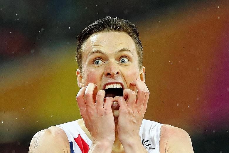 Karsten Warholm, 21, mimics Norwegian artist Edvard Munch's The Scream after winning the men's 400m hurdles final on Wednesday.
