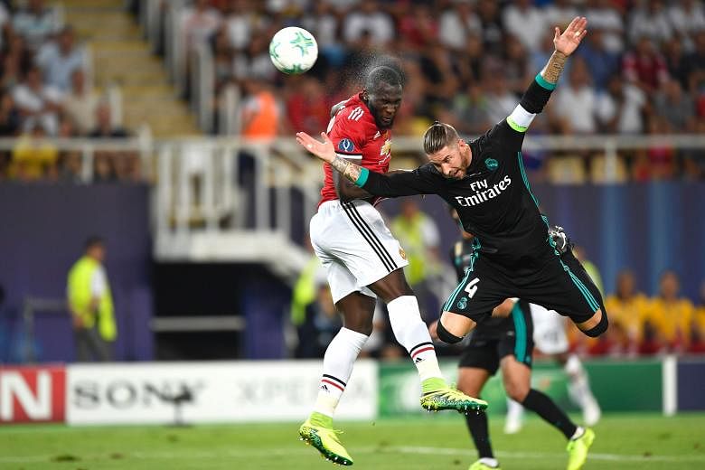 Manchester United striker Romelu Lukaku (far left) vies with Real Madrid defender Sergio Ramos for the ball during the Uefa Super Cup match in Skopje. United manager Jose Mourinho said the chance to play the European champions in a competitive match 