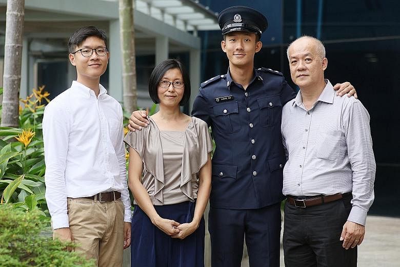Inspector Gabriel Tan Jin Hsi with brother Samuel, mother Pearly Chuang and father Tan Yok Khoon. "As a child, Gabriel did not like to read, but whenever we went to the library, he would head straight for the detective stories... He's always been int