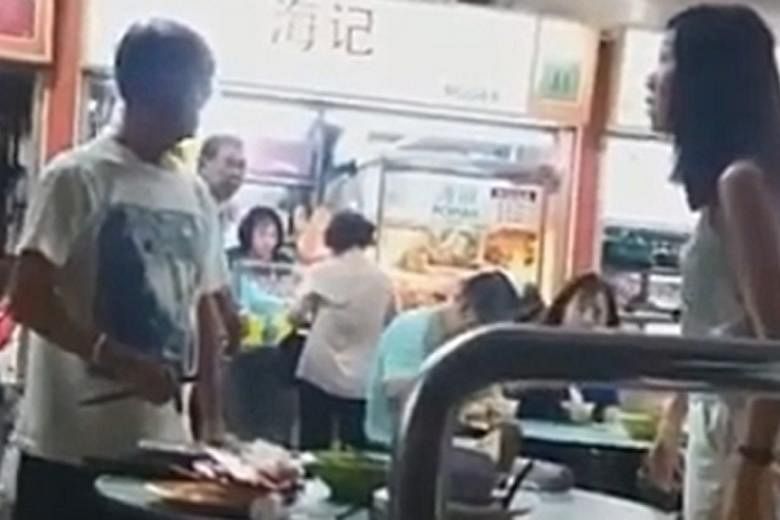 Mr Chow Chuin Yee and Ms Tay Puay Leng (both left) were fined after a video (above) of them arguing with a 76-year-old man, Mr Ng Ai Hua, and shoving him went viral. The couple acknowledged that their actions were "shameful, selfish and appalling" an