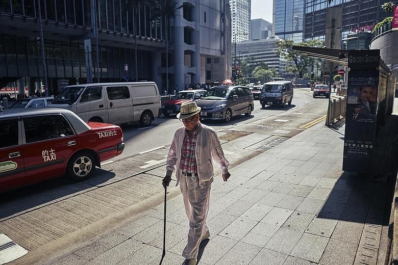 This man photographed in Hong Kong's financial district reminded Xu of a style he knew from old films. "He captures this sense of a bygone Hong Kong that I rarely see anymore, that you see only in the older generation," he said.