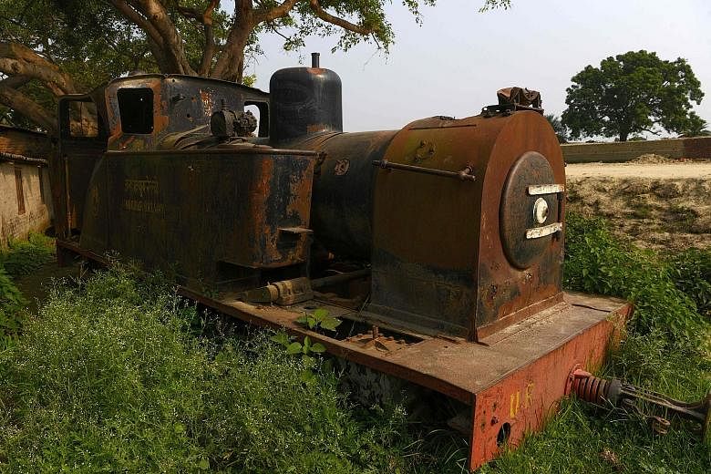 An old train engine of the Nepal Railway Corporation lies abandoned in Janakpur. Since 2014, the train has sat there, its rusting carcass a playground for local children.