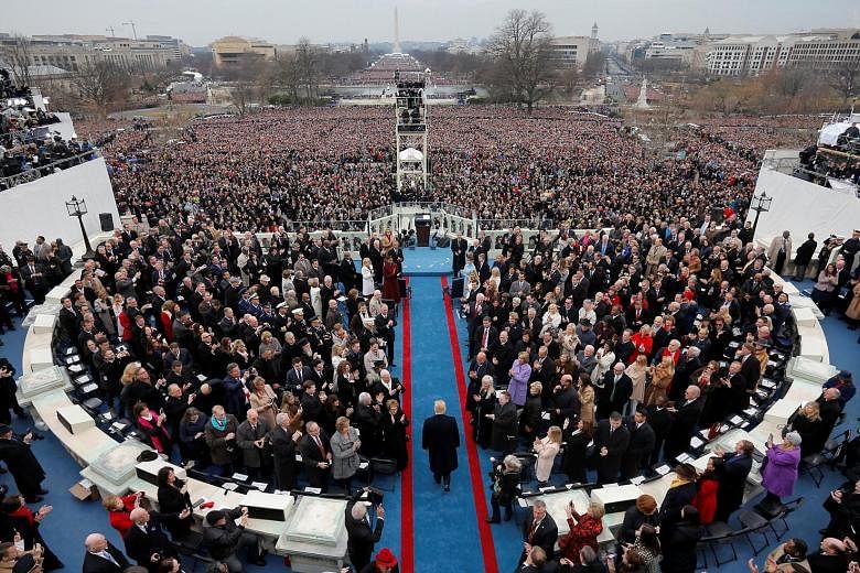 Former White House press secretary Sean Spicer called the crowds watching Mr Donald Trump's presidential inauguration in January (above) the largest, "period", despite photographs showing otherwise.