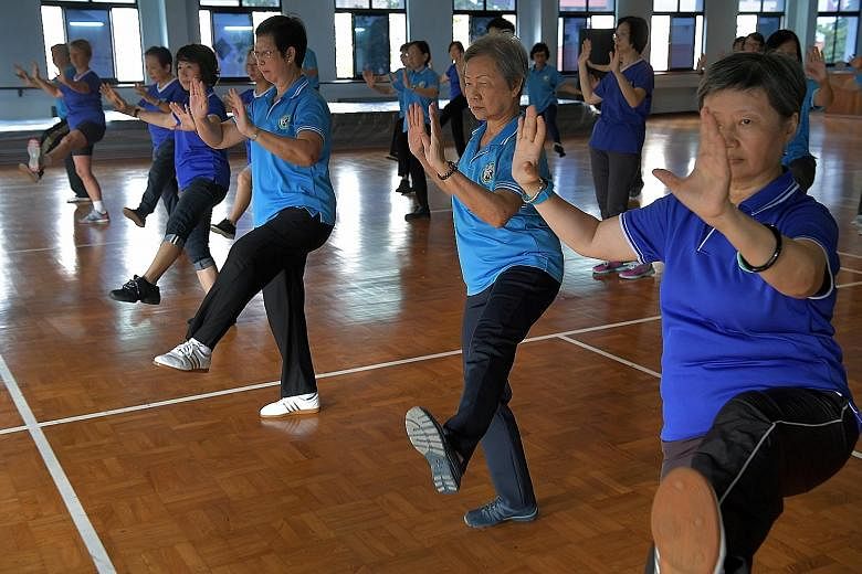 Regulars at a class held by taiji instructor Jennifer Chung at a badminton court in Bishan.