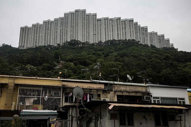 Prices at Wonderland Villas hilltop residential complex in the Kwai Fong district of Hong Kong have risen, waned and risen again. Home prices in the city have shot ever higher, bouncing back from the global financial crisis and bouts of government co