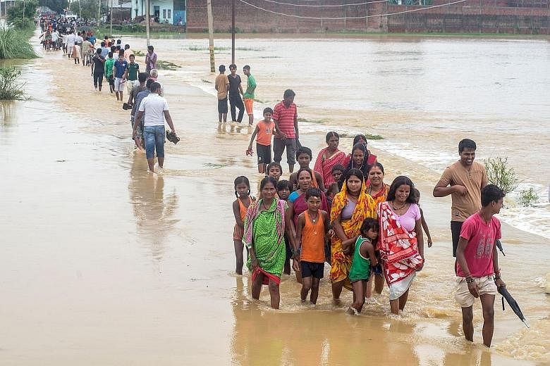 A flooded area in Birgunj Parsa district, some 200km south of Kathmandu, on Sunday. The death toll from flash floods and landslides in Nepal rose to 70 yesterday.