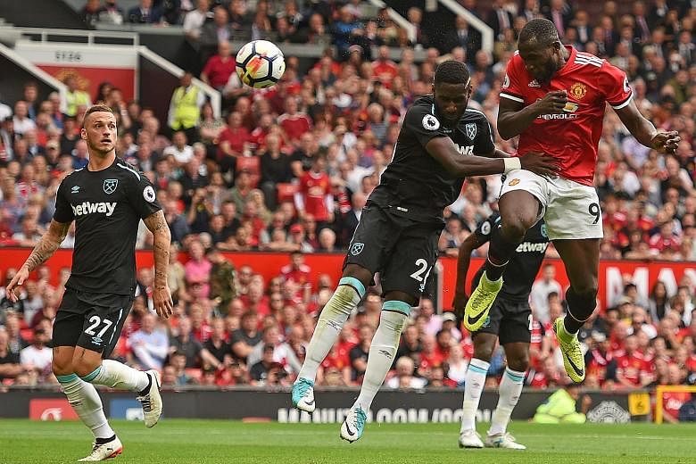 Manchester United striker Romelu Lukaku (No. 9) heading his side's second goal in the 52nd minute. He has made an encouraging start to his Old Trafford career despite lofty expectations as United's second-most expensive transfer and will likely lead 