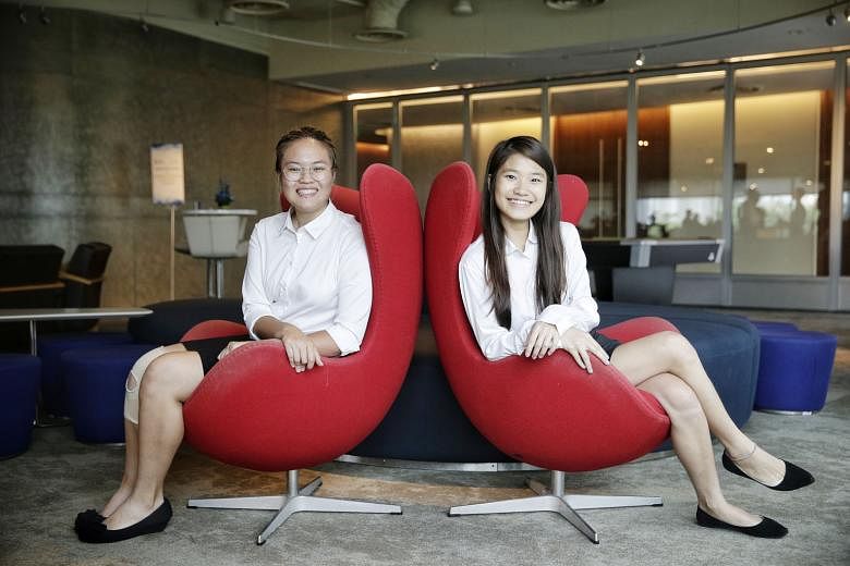 Quantedge Foundation scholarship holders Lee Wen Hui (left) and Joyce Lee are among the 13 students who have received the bond-free scholarship this year.