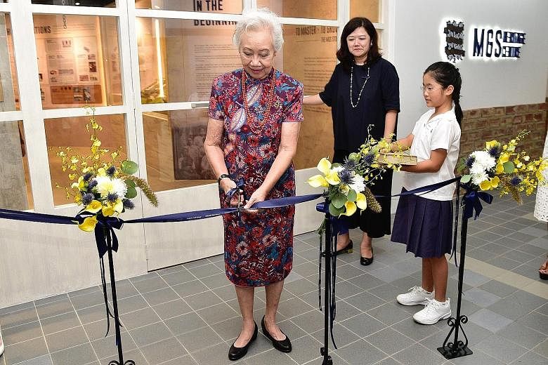 Mrs Anna Tham, the longest-serving principal of Methodist Girls' School - from 1977 to 1994 - at the official opening of the newly renovated heritage centre yesterday, with MGS Alumnae Association president Tjio Bee Ann.