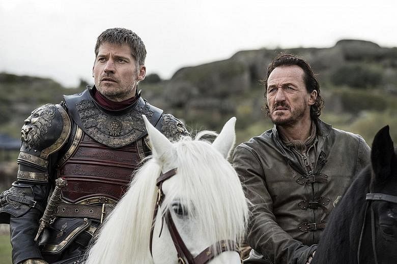 A hacker released material from Game Of Thrones, which stars Nikolaj Coster-Waldau (far left) and Jerome Flynn, that had been stolen from HBO.