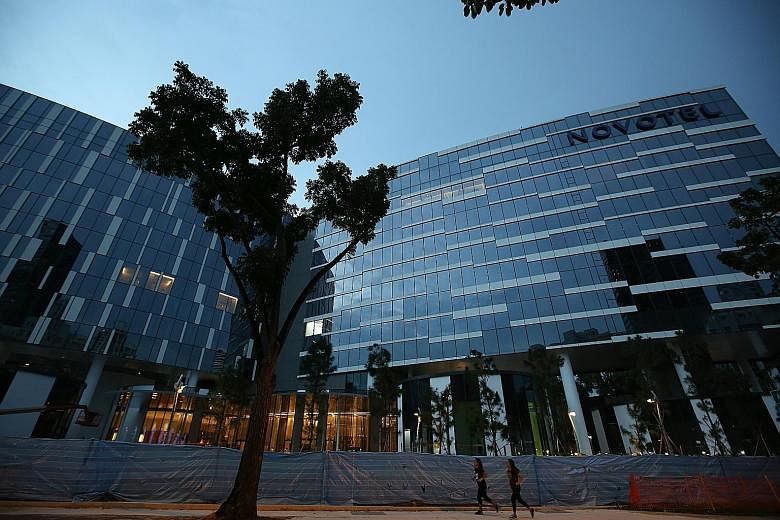 Oxley's $900 million project received its temporary occupation permit on Aug 3. Visitors can choose from the 254-room Novotel hotel or the 518-room Mercure, which are both near the Orchard Road shopping district.