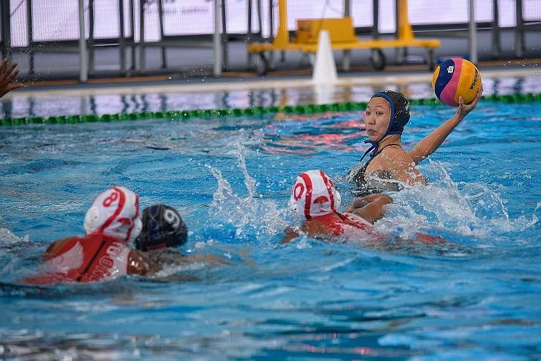 Angeline Teo taking a shot against Indonesia at the National Aquatics Centre in Bukit Jalil. She scored a hat-trick in Singapore's 7-6 win as the team fended off a strong Indonesian comeback in the final period.