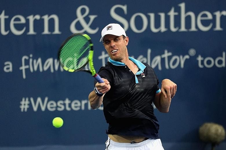 Wimbledon semi-finalist Sam Querrey returning in his 6-3, 6-0 win over Stefan Kozlov at the Cincinnati Masters in Ohio.