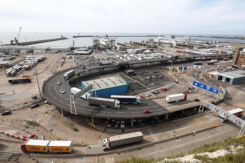 Lorries travel along an exit ramp at the Port of Dover. Britain says its membership of the EU Customs Union, which currently allows for the tariff-free movement of goods, will end along with its membership of the single market when it leaves the bloc