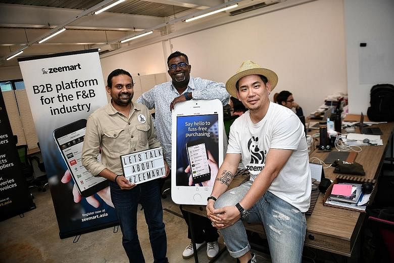 Zeemart co-founders Neeraj Sundarajoo (left) and Keith Tan, and its rainmaker, Mr Prakash Somosundram, are hoping most restaurants in Singapore will use its business-to-business platform. They are targeting to have 1,000 restaurants on their platform