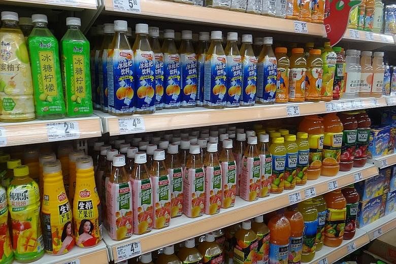 Sino Grandness juices under the Garden Fresh brand in a Chengdu supermarket in China's Sichuan province. Sales of overseas canned products fell 6.3 per cent in the first half of the year, while sales of Garden Fresh juices dropped by 18.4 per cent. D