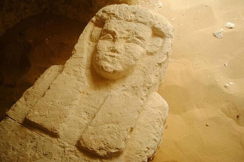 One of the sarcophagi that was found in a cemetery south of Cairo dating back about 2,000 years. Three tombs were found by archaeologists.