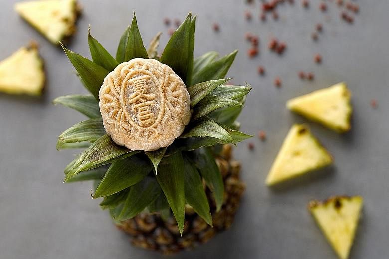 The Pineapple Pink Peppercorn snowskin mooncake from Summer Palace.