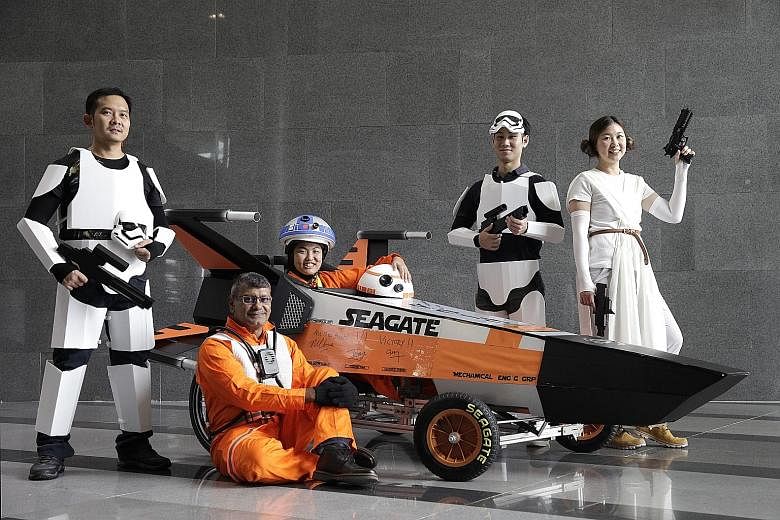 Yolo team members from Seagate Singapore Design Centre The Shugart, including (from far left) Henry Go, Xavier J. Paliath, Goh Sok Li, Win Yongrattana and Chong Sien Huay, modelled their soapbox racer after the Star Wars X-wing starfighter.