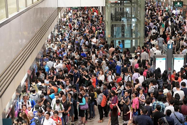 The scene at Bishan MRT station at about 8.30am yesterday. A defective train added travel time of up to 45 minutes between Marina South Pier and Sembawang on the North-South Line. Commuters experienced delays on the Downtown Line as well, also due to