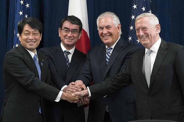 (From left) Japanese Defence Minister Itsunori Onodera, Japanese Foreign Minister Taro Kono, US Secretary of State Rex Tillerson and US Defence Secretary James Mattis in Washington.