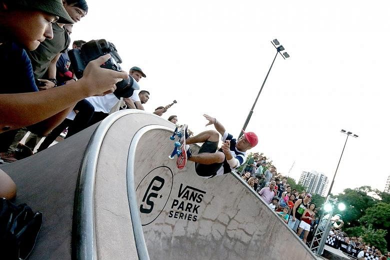 Japanese teenager Kensuke Sasaoka entertaining about 100 fans as he wins the men's category in the Vans Park Series Asian Continental skateboarding championships.