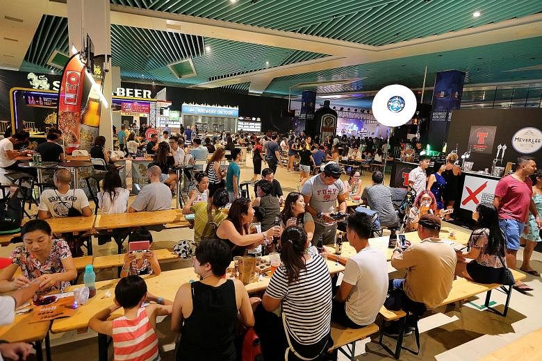 Children were allowed to go to Beerfest Asia at the Marina Bay Cruise Centre yesterday, and, for many, it turned out to be a family affair. The air-conditioned venue was comfortable enough to keep the children happy while their parents got to try out