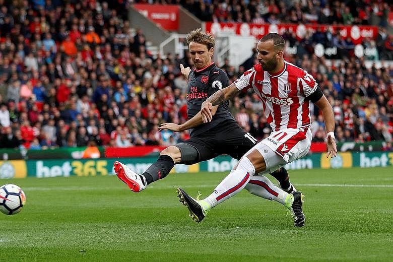 Stoke's Jese Rodriguez slotting home the 47th-minute winner after a rapid counter-attack. Arsenal next play Liverpool at Anfield on Sunday with question marks over their rearguard.