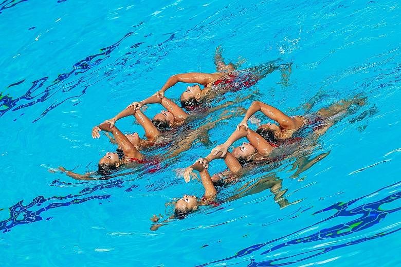 Singapore performing their team free routine that resulted in a score of 75.1333. They won the gold medal yesterday while Malaysia were second.