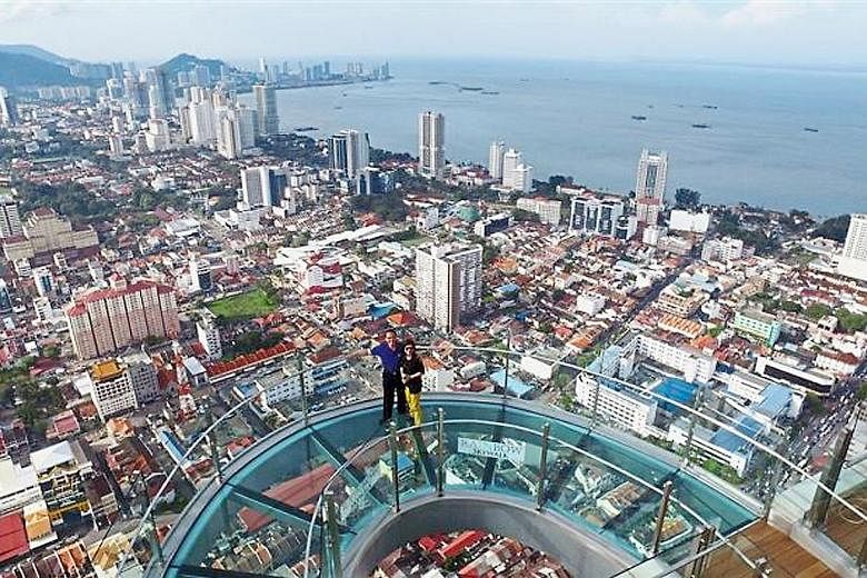 The Rainbow SkyWalk at Komtar mall in George Town, with a breathtaking view of the Penang coastline. The heady pace of development in the state, spurred further by George Town's listing as a Unesco World Heritage Site, has sent property prices and li