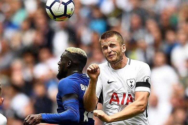 Tottenham's Eric Dier in an aerial battle against Chelsea's Tiemoue Bakayoko during the EPL champions' 2-1 win at Wembley on Sunday.