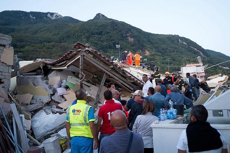 An earthquake hit the tourist-packed Italian holiday island of Ischia, killing at least two people, injuring dozens of others and trapping three young brothers in the rubble. Many tourists and residents on the island off the coast of Naples fled afte