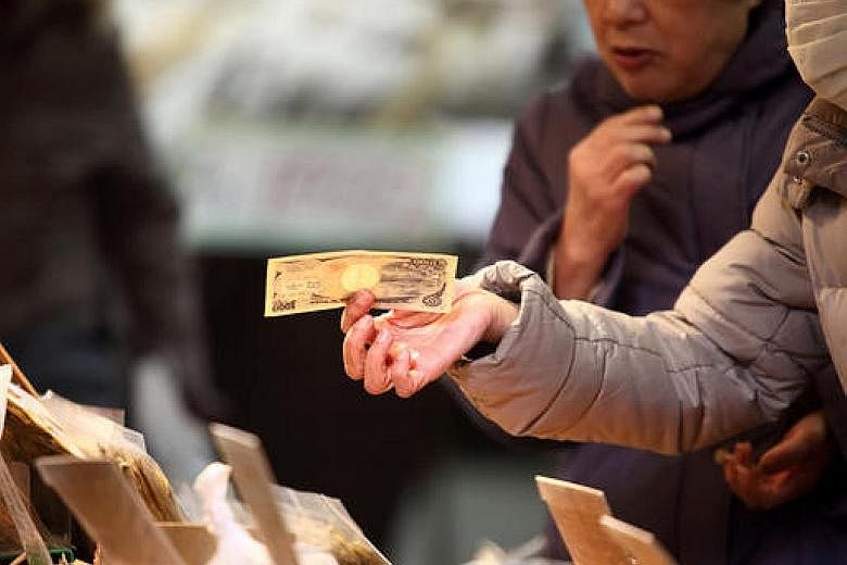 Many Japanese still prefer to carry wads of cash around, given Japan's low crime rate. This is despite cashless payment options being accepted by businesses such as convenience stores.