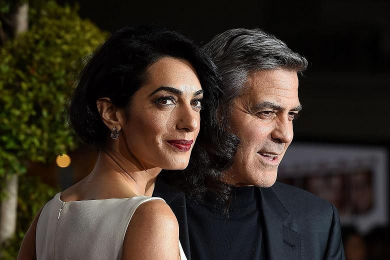 The donation comes from the Clooney Foundation for Justice, which the couple (left) established last year.