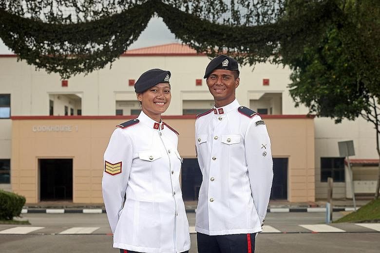 3SG Farah Halim, 25, with her husband 3SG Raj Kishen Ravichandran, also 25. Both were among the1,134 specialist cadets at the 32nd Specialist Cadet Graduation Parade held at Pasir Laba Camp yesterday. Ms Halim received the Silver Bayonet while her hu