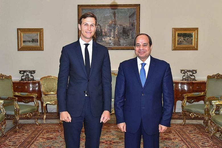 Mr Jared Kushner, senior adviser to the US President, with President Abdel Fattah el-Sissi of Egypt. Both men gave no public hint of bilateral discord as they grinned and shook hands for the media.