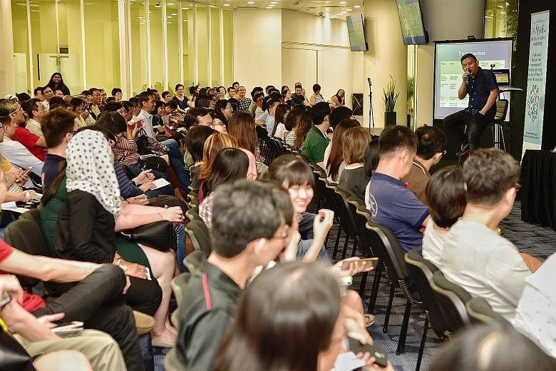 Some 350 people turned up for a talk by ST senior manpower correspondent Toh Yong Chuan on preparing for the challenges when making a mid-career switch. Over 2,300 people also tuned in to the session via a live stream.