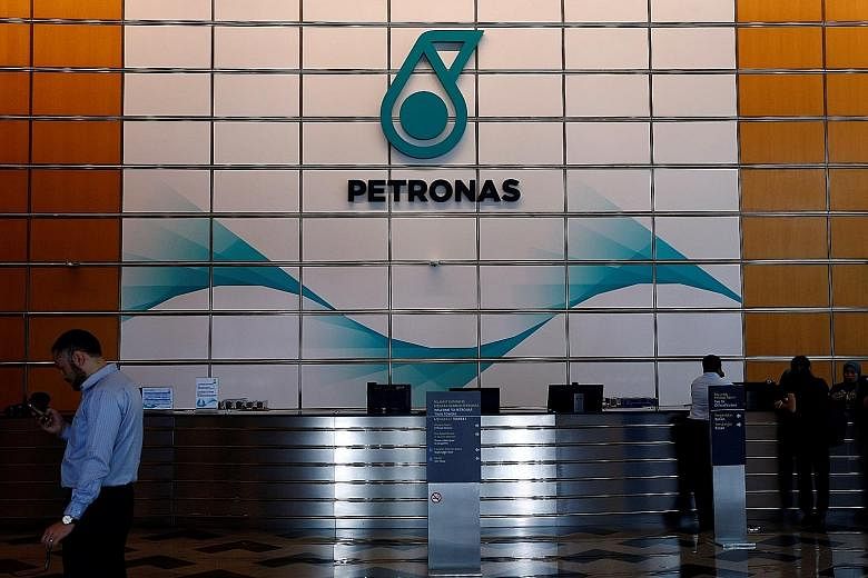 Petronas, Malaysia's only Fortune 500 company, will pay the government RM16 billion (S$5 billion) this year, up from its earlier commitment of RM13 billion, says its chief executive officer Wan Zulkiflee Wan Ariffin.