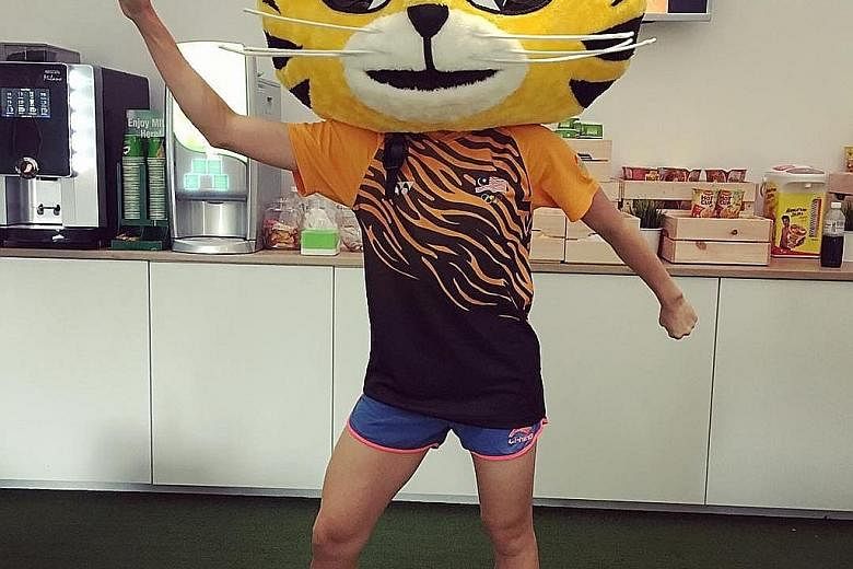 Malaysian diving world champion Cheong Jun Hoong was raring to go on the first day of the diving competition yesterday. Mascot duty in the Rimau suit appears to be one reason she will be taking part in only one event at these Games.