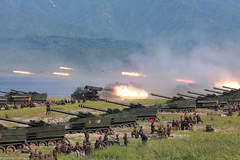 An undated photo released last Saturday shows the Korean People's Army in an exercise at an undisclosed location in North Korea. The country fired three missiles that day.