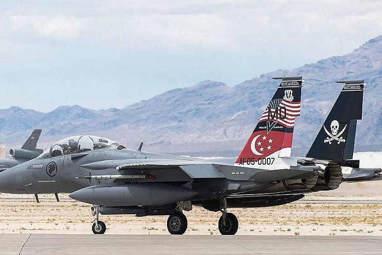 An RSAF F-15SG fighter jet preparing to take off on a strike mission during Exercise Red Flag - Nellis held in Nevada, in the United States, from Aug 14 to last Friday. The exercise, which saw participants engage in air combat and strike missions to 