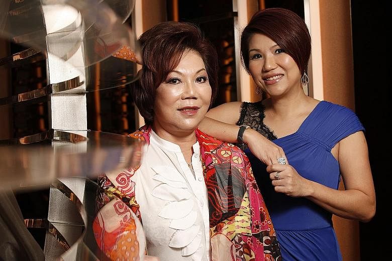 Madam Mary Chia, founder and former executive chairman of Mary Chia Holdings, with her daughter, Ms Wendy Ho Yow Ping, in a photo taken in 2012.