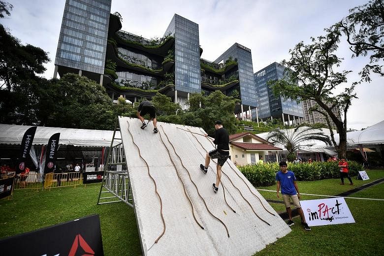 The People's Association Corporate Spartan challenge was one of the events at the ground-breaking ceremony for ImPAct @ Hong Lim Green. The new centre, spanning over 1,500 sq m, will have a multi-purpose fitness studio and a tech corner for charging 