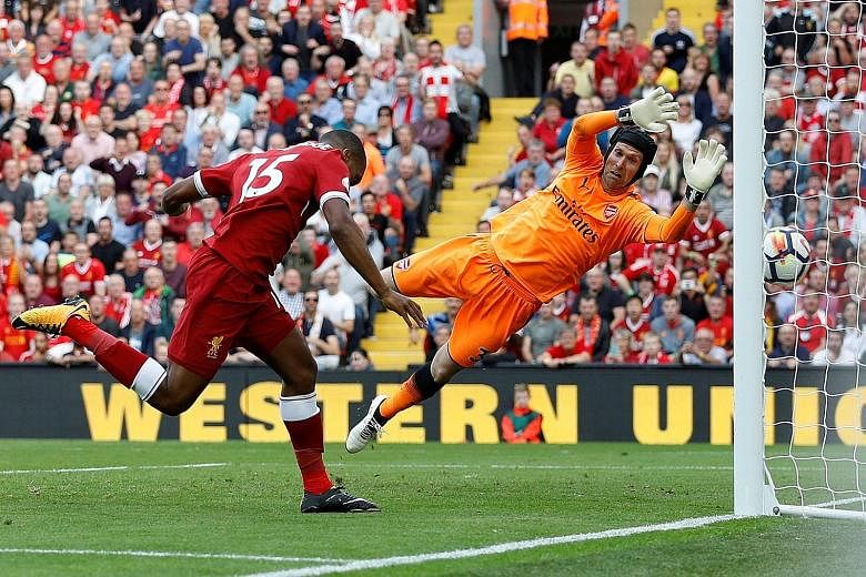 Goalkeeper Petr Cech cannot stop substitute Daniel Sturridge from heading in Liverpool's fourth goal against Arsenal on Sunday. Only West Ham (10) have conceded more Premier League goals this season than Arsenal (eight).