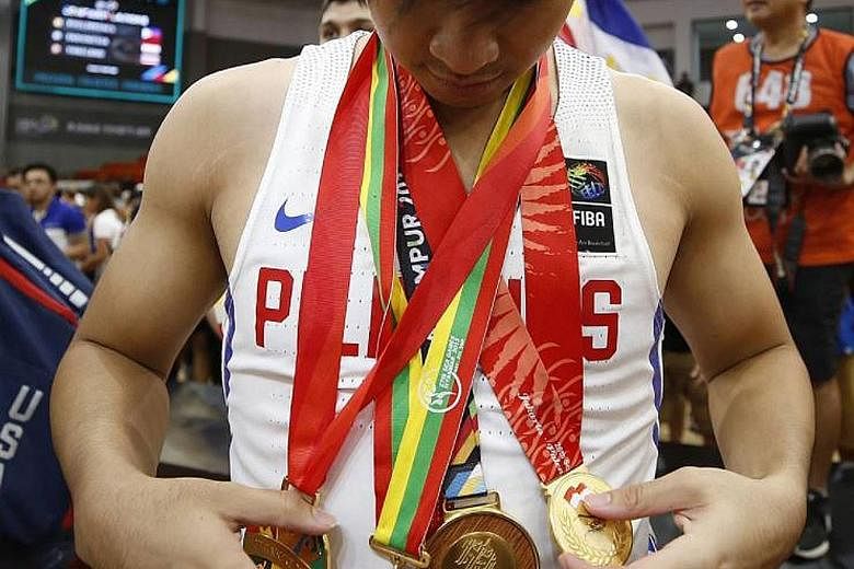 Filipino basketballer Kiefer Ravena makes it four of a kind. The guard's latest gold is in good company alongside the ones from the 2011, 2013 and 2015 Games. Singapore National Olympic Council president Tan Chuan-Jin's final post from Kuala Lumpur -