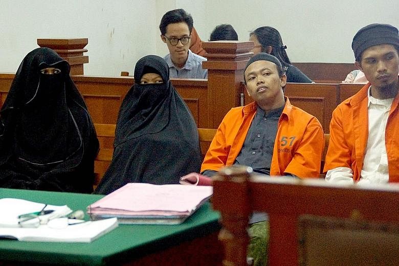 Dian Yulia Novi with her husband Nur Solihin at East Jakarta District Court in Jakarta last week. She was arrested last December at her rented house near Jakarta with a 3kg high-grade rice-cooker bomb, a day before the planned strike on the president