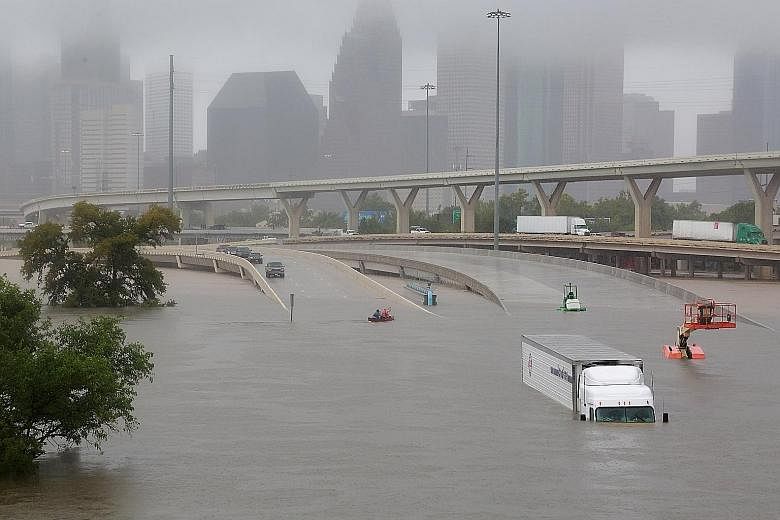Torrential rain due to Tropical Storm Harvey has flooded roads in Houston, Texas, including the Interstate 45 highway. Emergency officials said they expect over 30,000 people to seek refuge in temporary shelters. United States President Donald Trump 